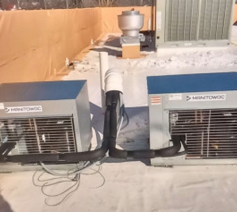 hvac repair installed on a roof top Crossfield TN