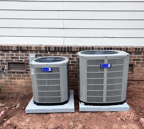 two hvac device installed exterior of a house Crossfield TN